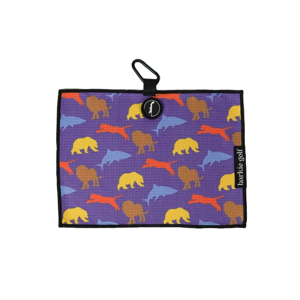Kids magnetic Golf towel with lion, tiger, shark, bear prints on a purple background, featuring a carabiner and 'barkie golf' branding.