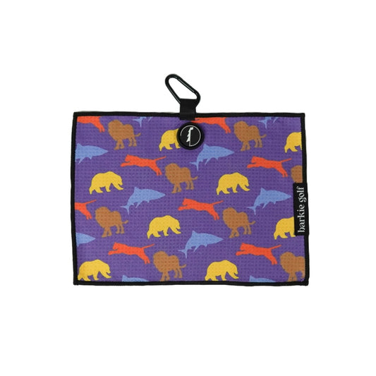 Kids magnetic Golf towel with lion, tiger, shark, bear prints on a purple background, featuring a carabiner and 'barkie golf' branding.